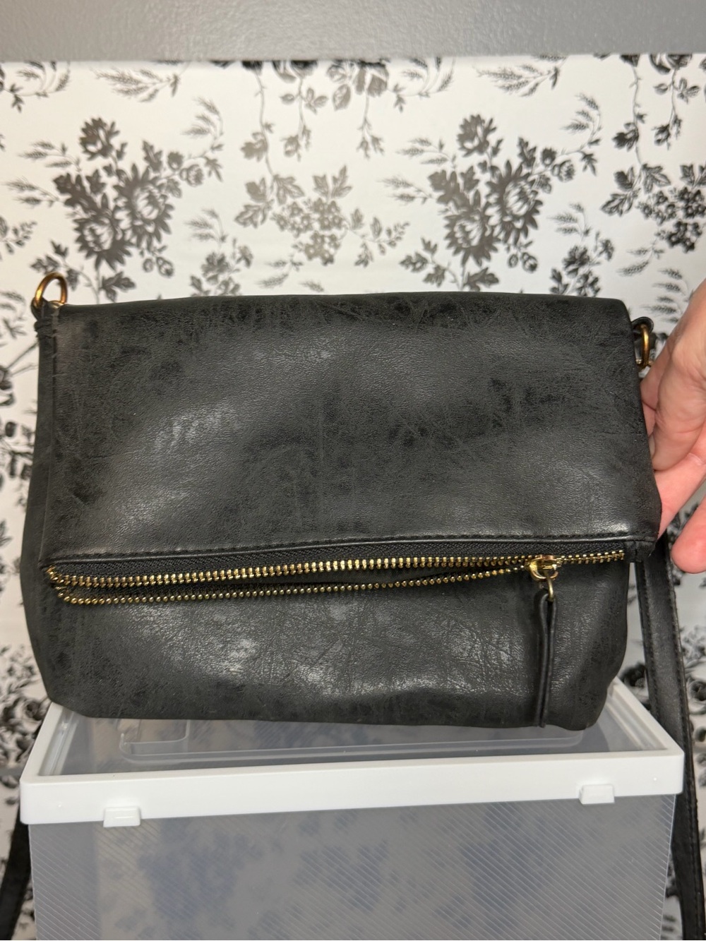 Black Fold-Over Crossbody Bag with Gold Zip Detail